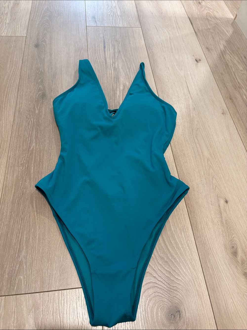 Sleek Teal V-Neck One-Piece Swimsuit